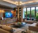 Modern living room with large windows and comfortable furniture.